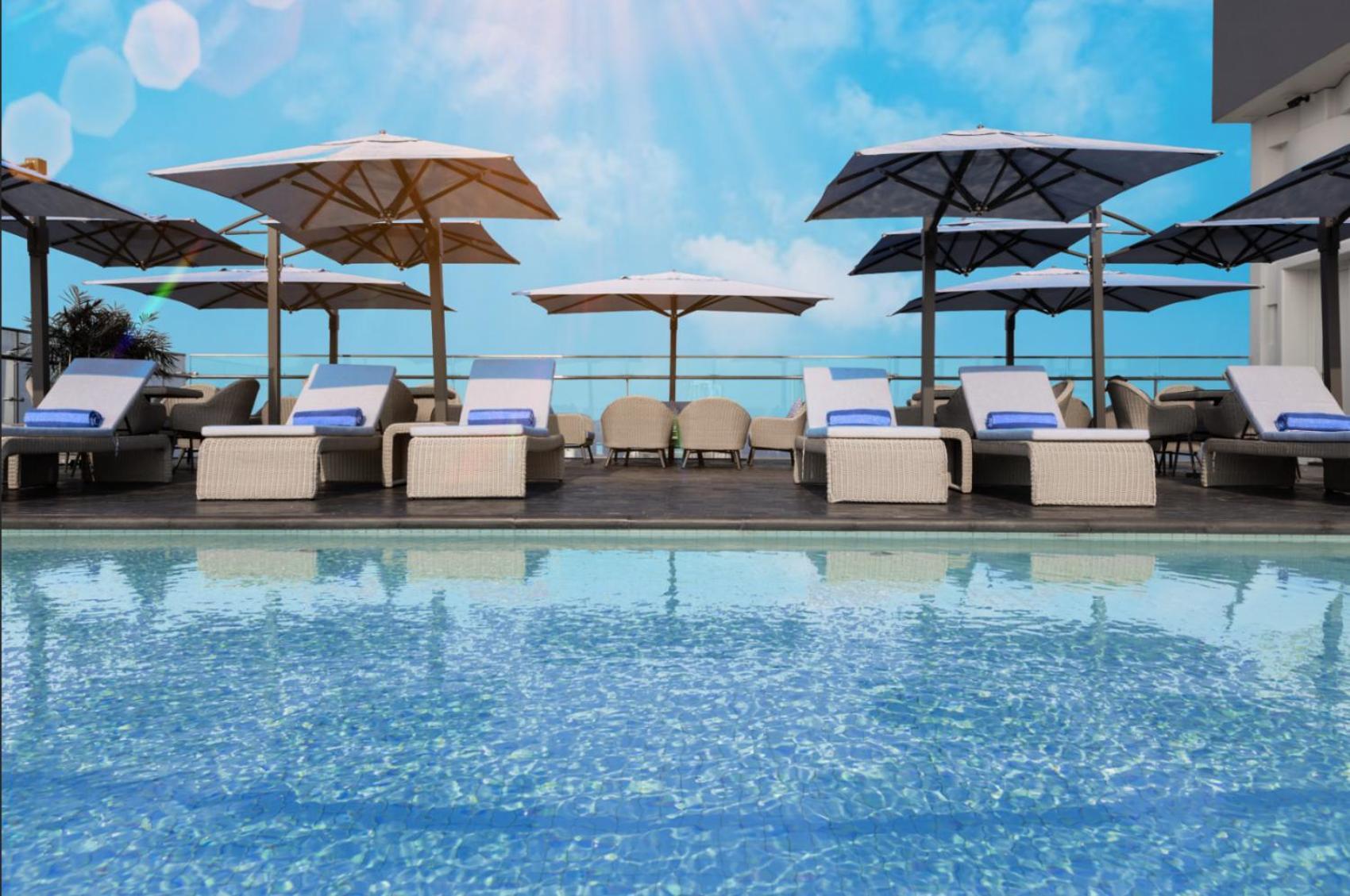 Wink Icon Hotel Danang Riverside - Luxury Suites - 24Hrs Stay & Rooftop Pool Bar Exterior foto
