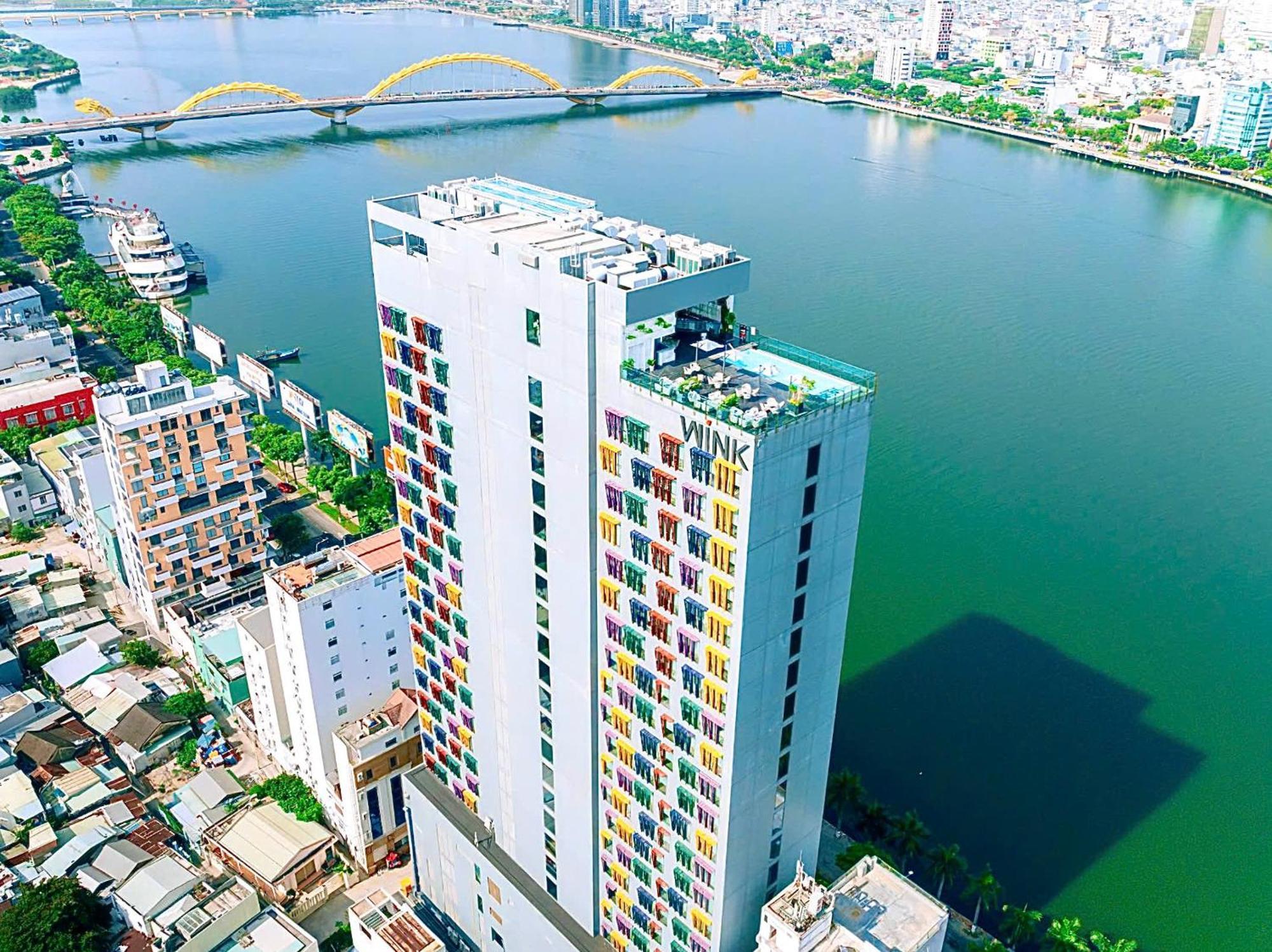 Wink Icon Hotel Danang Riverside - Luxury Suites - 24Hrs Stay & Rooftop Pool Bar Exterior foto